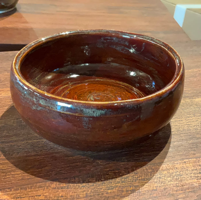 Brown barrel shaped bowl