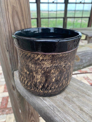 Brown and Black Pot