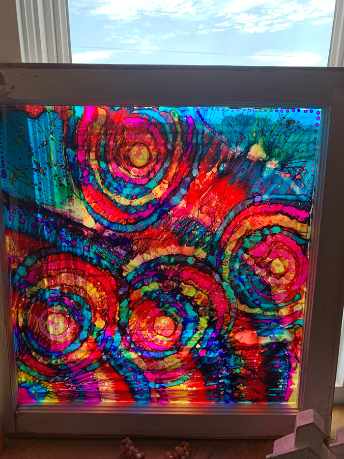 Alcohol paintings on vintage windows