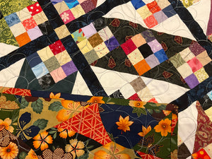 9 patch quilt with green border