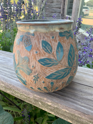 Hand carved and painted vases