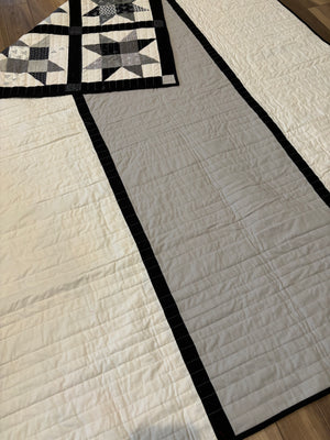 Black and white star quilt