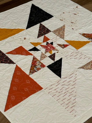 Orange star quilt