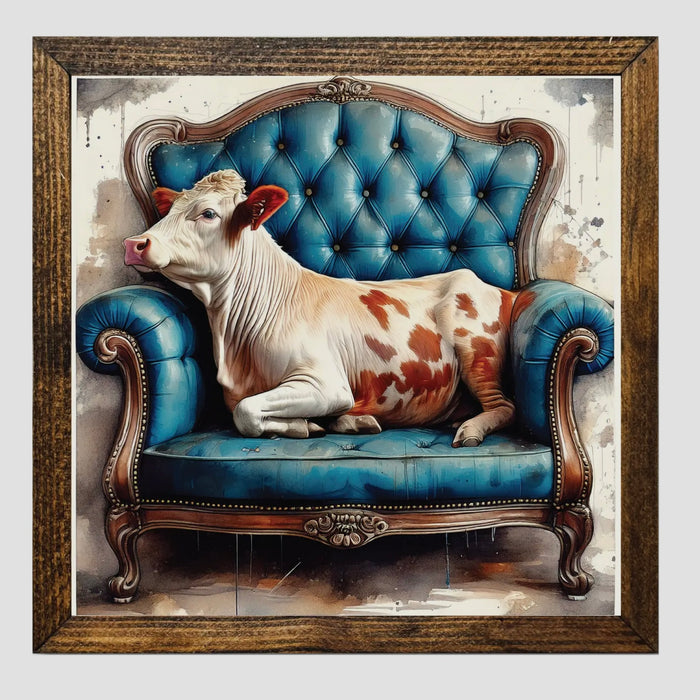 Framed Print of Calf on Vintage Sofa