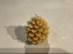 Pine cone candle