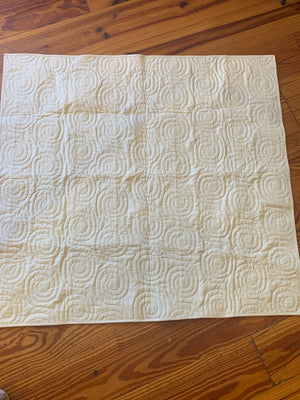 Yellow and purple triangle baby quilt