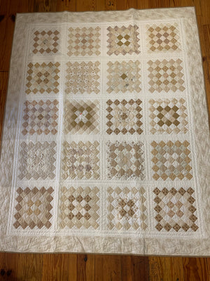 Granny square quilt tan and white