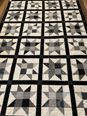 Black and white star quilt