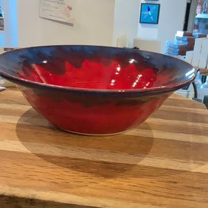 Red bowl with blue drip
