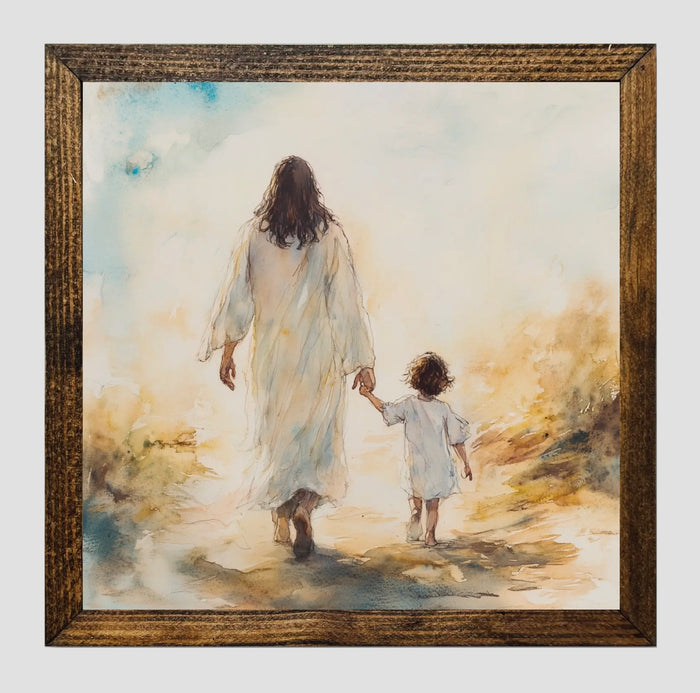 Framed Print of Jesus holding hand of child