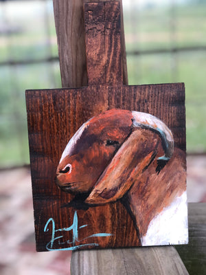 Goat painting on cheese board
