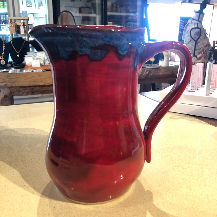 Red and blue pitcher