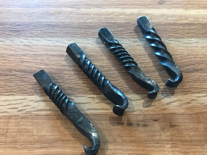 Hand forged bottle openers