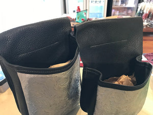 Pair of bison leather and cowhide game, shell and dove bags